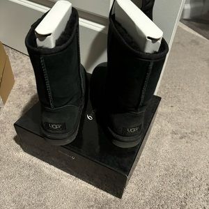 New women’s black tall UGGS size 7.5 never worn